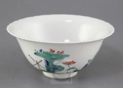 A Japanese Kakiemon style bowl, probably 18th / 19th century, the interior painted with butterflies,
