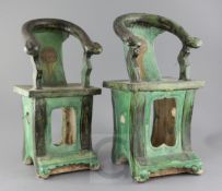 A near pair of Chinese sancai pottery models of horseshoe backed chairs, Ming dynasty, with openwork