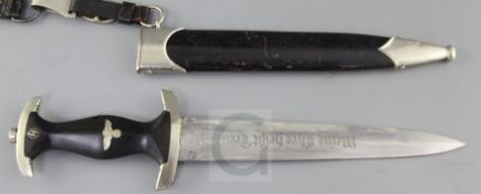 A Third Reich SS dagger with hanger, the blade inscribed Meine Ehre Heisst Treue, stamped EP & S