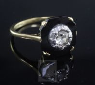 An 18ct gold, black onyx and diamond set octagonal tablet ring, size Q.