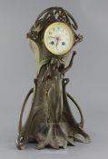 C. Bonnefond. A French Art Nouveau bronzed spelter mantel clock signed on the foot, 18.5in.