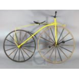 A wrought iron and ash model of a Michaux Velocipede bicycle, c.1865, with bright yellow painted