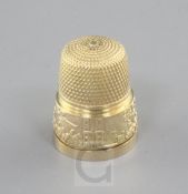 A 9ct gold commemorative Queen Elizabeth II 1953 Coronation thimble, James Swann & Son,