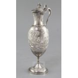 A late 19th century Indian silver pedestal ewer by Dass & Dutt, Bhowanipore, Calcutta, with vase