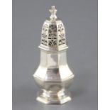 A George I silver octagonal baluster caster, with later engraved monogram, London, 1723, 13.5cm, 4.5