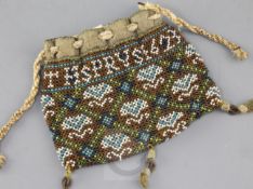 A James I beadwood purse, inscribed 'AN.GOLDSMETHSPRUS, 1623', 5.5 x 4.5in.