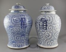 Two large Chinese blue and white vases and covers, 19th century, each painted with the character