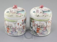 A pair of Chinese famille rose covered wine warmers and covers, late 19th century, each painted with