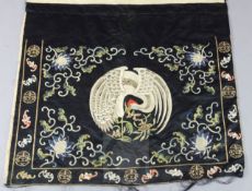 A Chinese black satin 'crane medallion' table frontal, late Qing dynasty, woven in long and metal