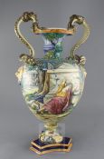 A large Italian maiolica Historiata Campana shaped urn, 20th century, painted with a battle scene