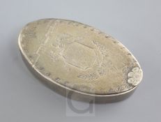 A George III silver oval snuff box by Phipps & Robinson, with engraved decoration and flowerhead