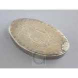 A George III silver oval snuff box by Phipps & Robinson, with engraved decoration and flowerhead