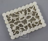 A Chinese white jade rectangular 'dragon' plaque, 17th / 18th century, the dragon amid scrolling