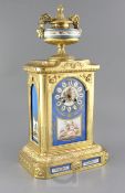 A late 19th century Louis XVI style gilt brass eight day striking mantel clock, with Sevres style