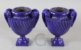 A pair of 19th century French blue enamelled cast iron garden urns, H.19in.