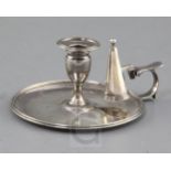 A George III silver reeded circular chamberstick and matching extinguisher by John Edwards,