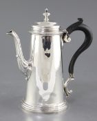 A George V silver coffee pot, Martin Hall & Co with turned finial, Sheffield, 1929, 20.3cm, gross