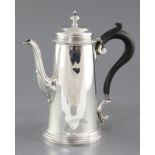 A George V silver coffee pot, Martin Hall & Co with turned finial, Sheffield, 1929, 20.3cm, gross