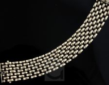 A 9ct gold brick link bracelet, 17.5cm.