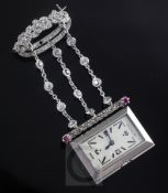 A 1920's rose cut diamond and ruby set staybrite steel Le Coultre lapel watch with diamond set