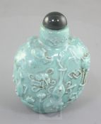 A Chinese turquoise glazed and moulded snuff bottle, 19th century, moulded in relief with ribbon