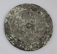 A Chinese bronze circular TLV mirror, Han dynasty, 1st century B.C. cast in relief with birds amid