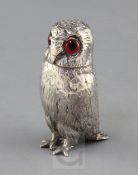 A Victorian novelty silver owl pepperette by George John Richards, with naturalistic feathers and