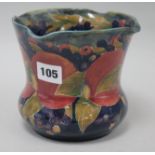 A Moorcroft blue ground vase