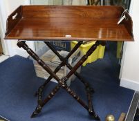 A Victorian mahogany carved butler's tray on turned stand W.76.5cm