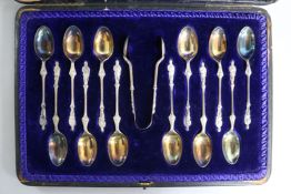 A cased set of twelve late Victorian silver apostle spoons, with tongs, London, 1896.