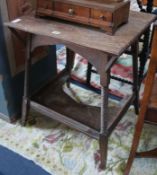 An Arts & Crafts oak table 61cm