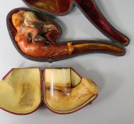 A 19th century carved Meerschaum pipe, in the form of a mermaid, cased, and another pipe bowl