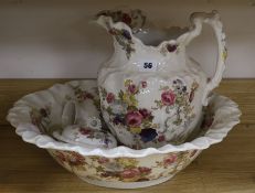 A Victorian four piece floral printed toilet set