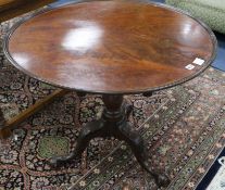 A George III mahogany tea table, with dished top and acanthus carved tripod W.85cm