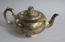 A Victorian silver squat circular teapot, William Robert Smily, London, 1853, gross 19 oz.