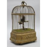 An automaton bird in a cage