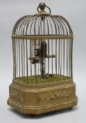 An automaton bird in a cage