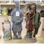 A Russian carved and painted wood figure of 'Grandfather Frost', signed to base and two other items,