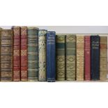 A collection of mainly leather-bound works of literature, including Thackeray, Pendennis, vols I-II,