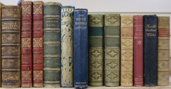 A collection of mainly leather-bound works of literature, including Thackeray, Pendennis, vols I-II,