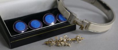 A pair of silver and enamel cufflinks, a Hermes steel and enamel bracelet and a 9ct seed pearl bar