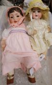 A Schoenau & Hoffmeister PB in a star B8 bisque head doll and another German bisque head doll 'PM