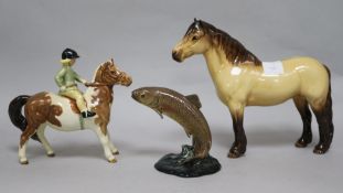 A Beswick horse and rider, a fish and a horse