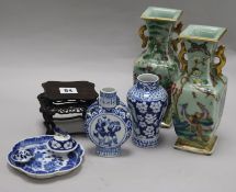 Two famille verte vases, two blue and white Chinese vases, a dish and a carved stand