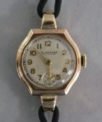 A lady's Audemars 9ct gold-cased wristwatch, with silvered dial, subsidiary seconds and gilt hands