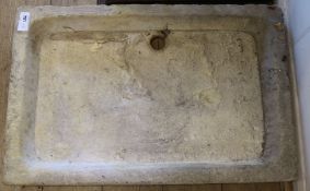 An 18th century limestone sink, 87 x 57cm