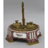 A French gilt metal mounted porcelain inkstand