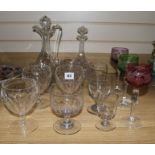 A collection of goblets, etched glassware and two decanters