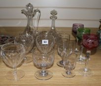 A collection of goblets, etched glassware and two decanters