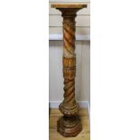 An early 19th century russet marble pedestal